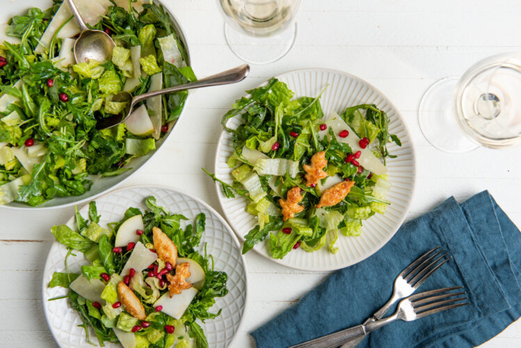 Thanksgiving salad with pears,  Parmesan and pomegranate seeds, starring puff pastry croutons